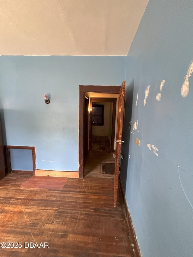 208 Bellevue Ave, Daytona Beach, FL 32114 - hall with wood finished floors and baseboards