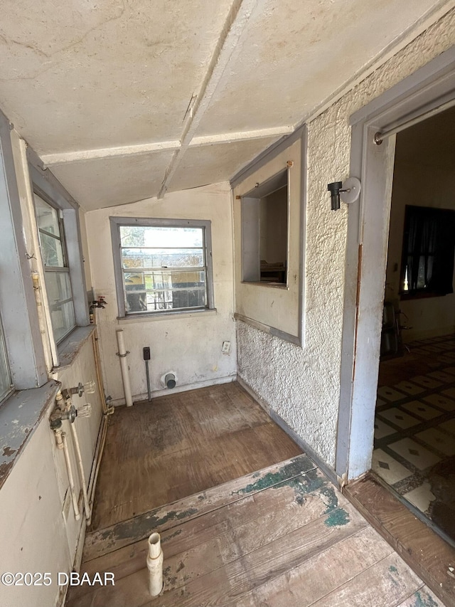 208 Bellevue Ave, Daytona Beach, FL 32114 - empty room featuring vaulted ceiling and wood finished floors