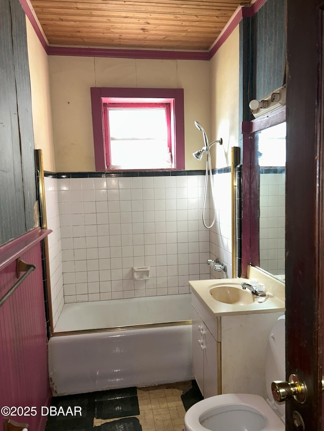 208 Bellevue Ave, Daytona Beach, FL 32114 - full bath with wooden ceiling, vanity, a wainscoted wall, crown molding, and tile walls