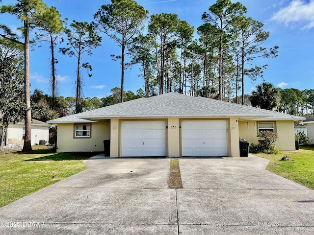 ranch-style house featuring a garage and a front yard