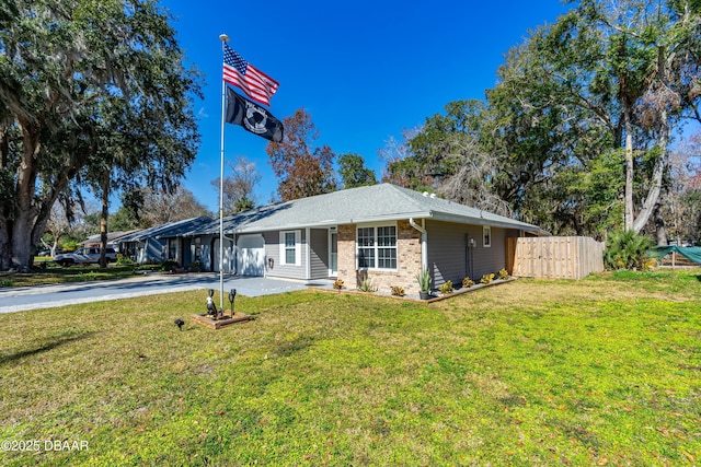 single story home featuring a front yard