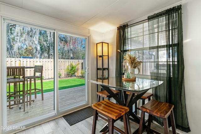 dining area with wood-type flooring