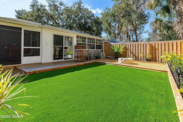 view of yard featuring a wooden deck