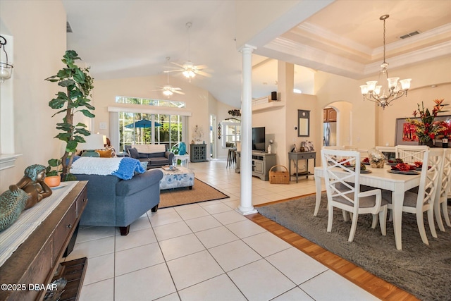 dining room featuring visible vents, high vaulted ceiling, crown molding, light tile patterned floors, and ornate columns