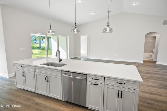 kitchen with dishwasher, hanging light fixtures, sink, a kitchen island with sink, and dark hardwood / wood-style floors