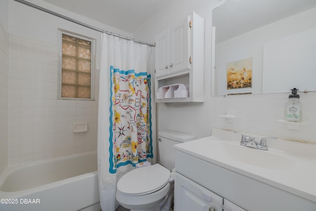 full bathroom with vanity, shower / bath combo, and toilet