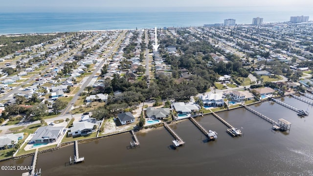 drone / aerial view with a water view