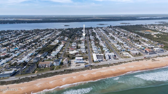 aerial view with a beach view and a water view