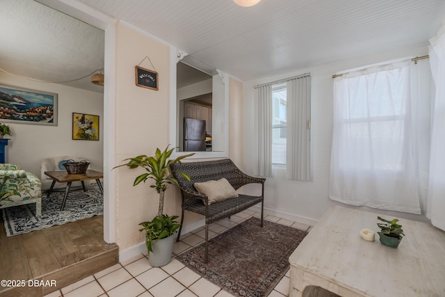 living area with light hardwood / wood-style flooring