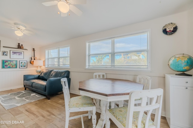 dining room featuring ceiling fan and light hardwood / wood-style floors