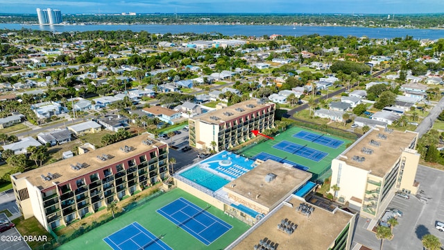 birds eye view of property with a water view