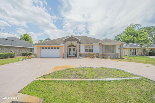 ranch-style home with french doors and a front lawn