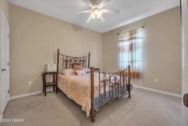 bedroom featuring ceiling fan and carpet floors