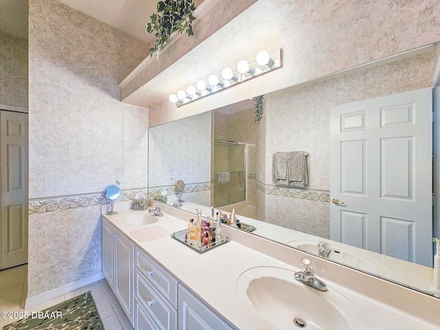 bathroom with vanity and tile patterned floors