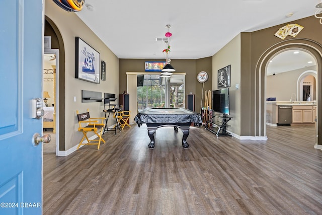 rec room with sink, wood-type flooring, and billiards