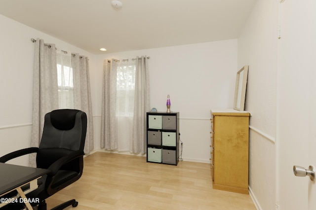 office space with hardwood / wood-style flooring