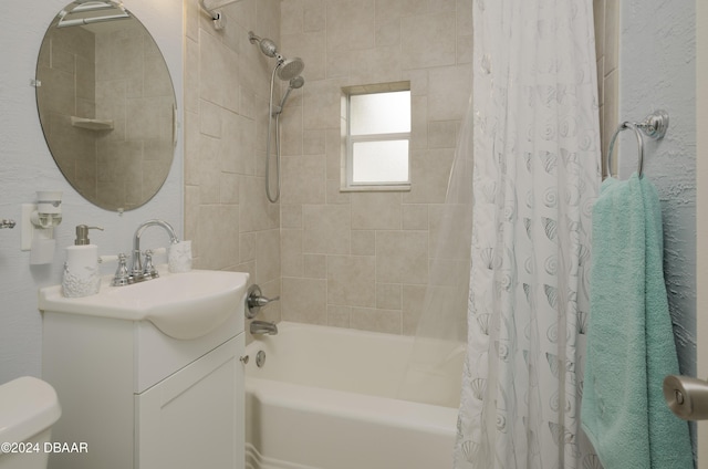 full bathroom with vanity, shower / bath combination with curtain, and toilet