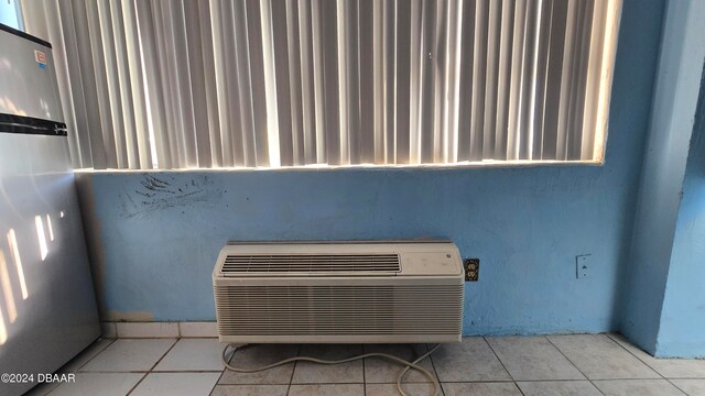 interior details with stainless steel refrigerator