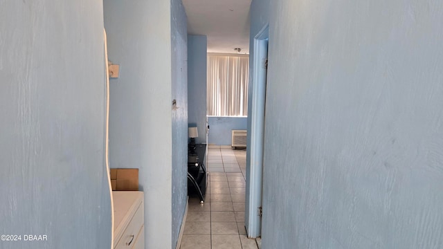 hallway featuring light tile patterned flooring