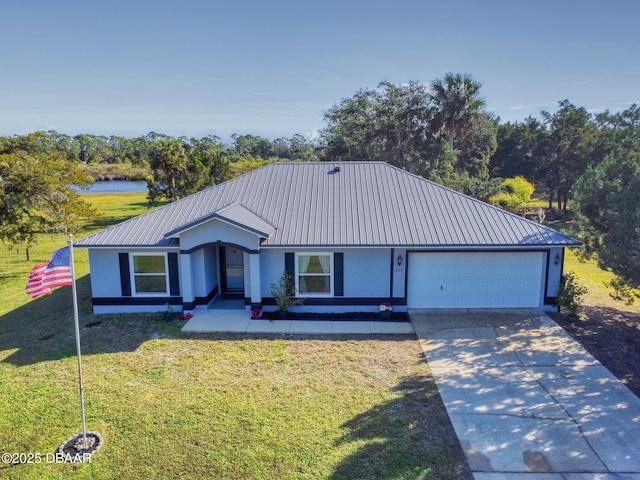 ranch-style house featuring a front lawn and a garage