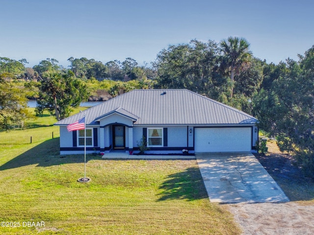 single story home featuring a front lawn and a garage