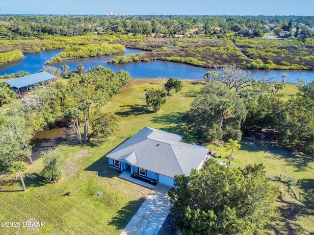 bird's eye view with a water view