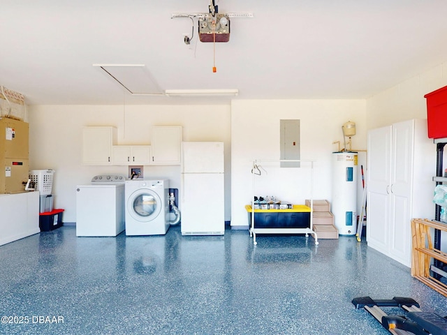 garage featuring electric water heater, washer and dryer, white fridge, electric panel, and heating unit