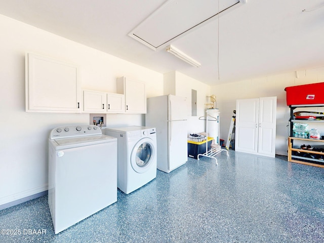 clothes washing area featuring cabinets, electric panel, and independent washer and dryer