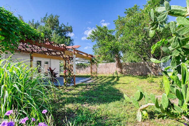 view of yard featuring a pergola and a patio area