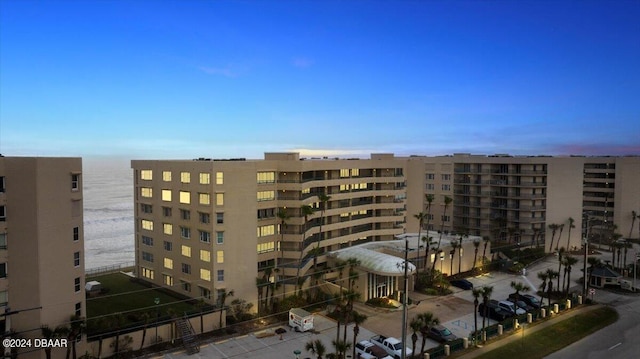 outdoor building at dusk with a water view