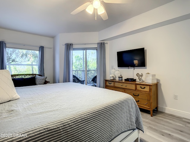 5300 S Atlantic Ave Unit 10-205, New Smyrna Beach, FL 32168 - bedroom with a ceiling fan, light wood-style flooring, access to exterior, and baseboards