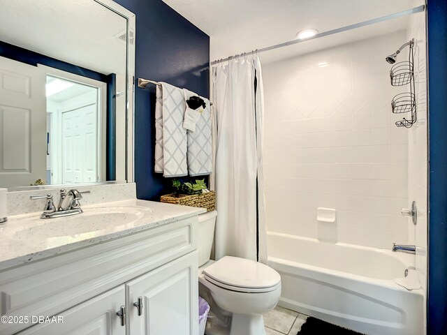 5300 S Atlantic Ave Unit 10-205, New Smyrna Beach, FL 32168 - full bathroom featuring vanity, toilet, shower / bath combination with curtain, and tile patterned flooring