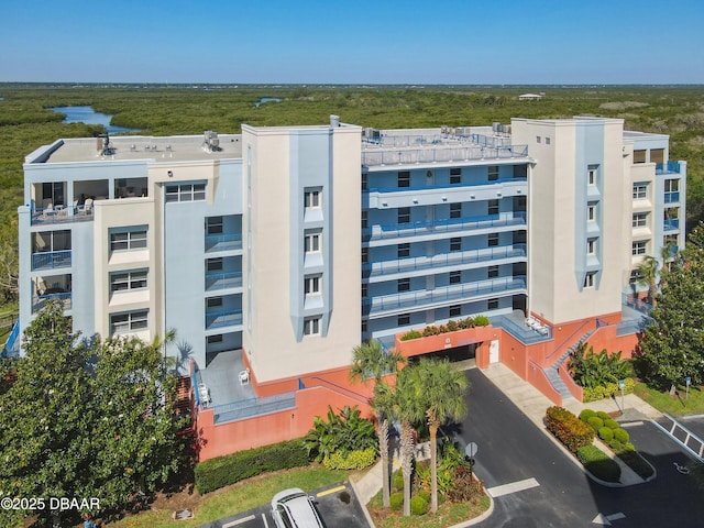 5300 S Atlantic Ave Unit 10-205, New Smyrna Beach, FL 32168 - view of property featuring uncovered parking