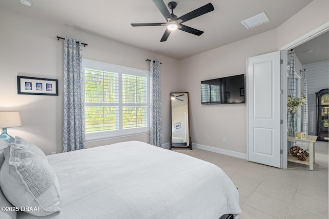 17 Newhaven Ln Unit 17, Ormond Beach, FL 32174 - bedroom featuring light tile patterned floors and a ceiling fan