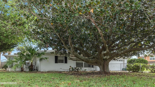 view of property exterior featuring a yard