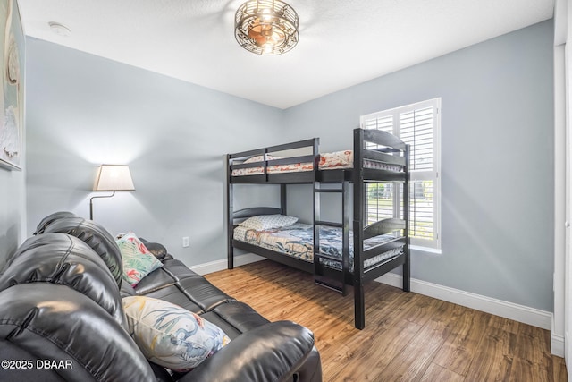 43 Pergola Pl, Ormond Beach, FL 32174 - bedroom with wood finished floors and baseboards