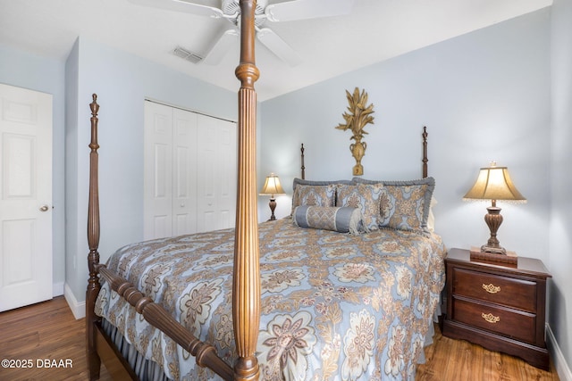 43 Pergola Pl, Ormond Beach, FL 32174 - bedroom featuring a ceiling fan, wood finished floors, visible vents, and a closet