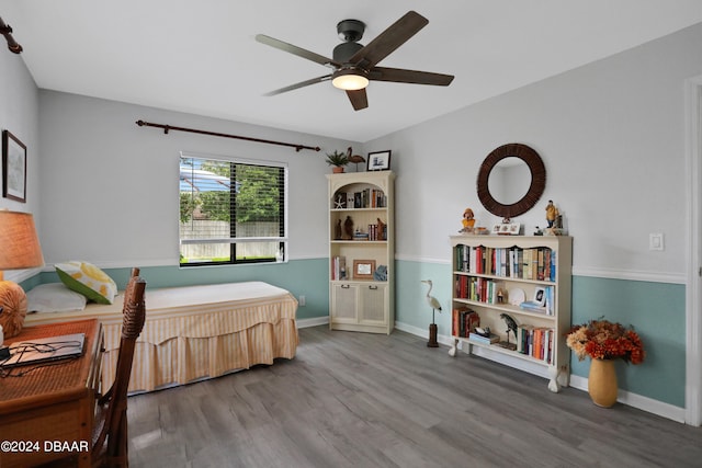 bedroom featuring hardwood / wood-style flooring and ceiling fan