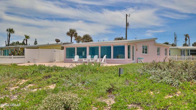 rear view of property with a patio area