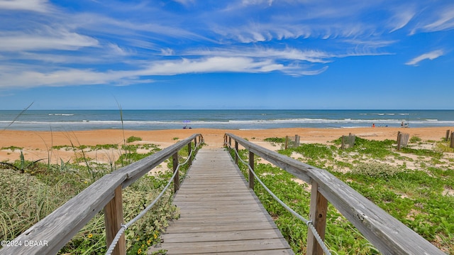 view of water feature with a beach view