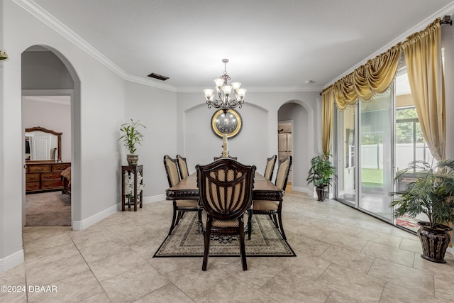 dining room featuring a chandelier and ornamental molding