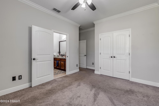 unfurnished bedroom with ensuite bathroom, light carpet, ceiling fan, and crown molding