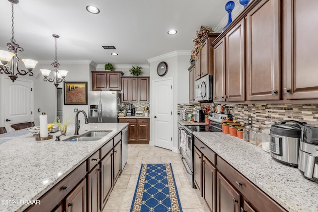 kitchen featuring crown molding, appliances with stainless steel finishes, hanging light fixtures, sink, and a chandelier