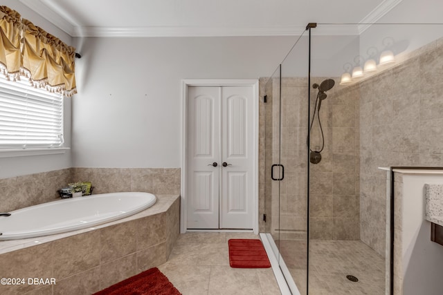 bathroom with tile patterned flooring, shower with separate bathtub, and crown molding