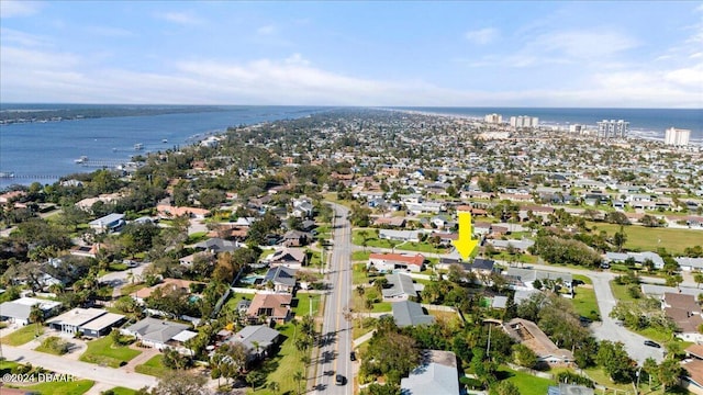 drone / aerial view with a water view