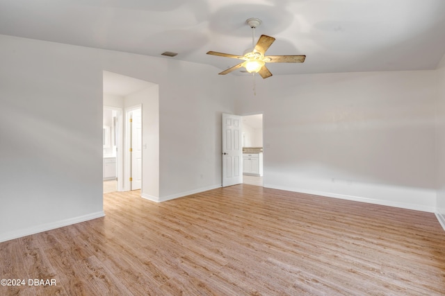 2853 Turnbull Estates Dr, New Smyrna Beach, FL 32168 - unfurnished room featuring ceiling fan, light hardwood / wood-style flooring, and vaulted ceiling