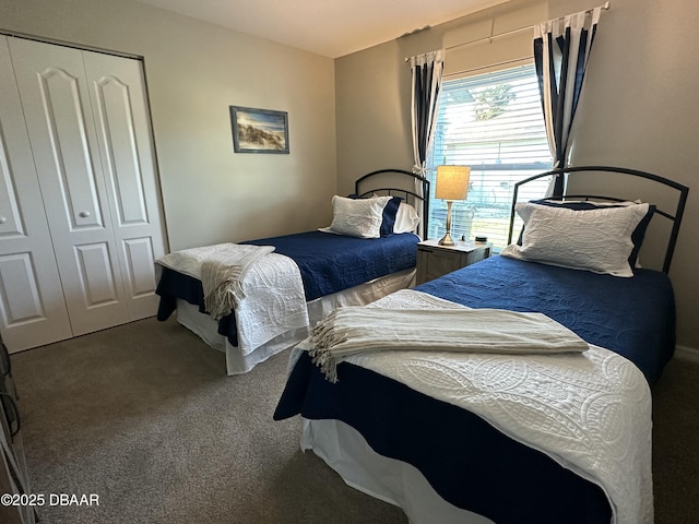 carpeted bedroom with a closet