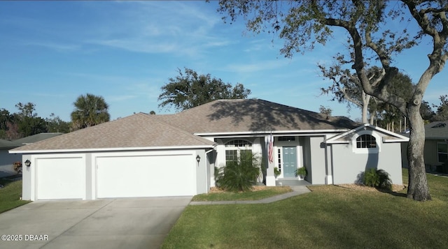 ranch-style home with a garage and a front lawn