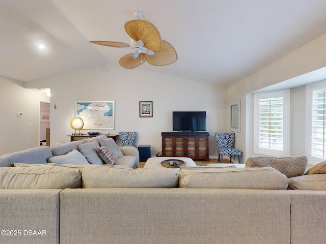 living room with vaulted ceiling and ceiling fan