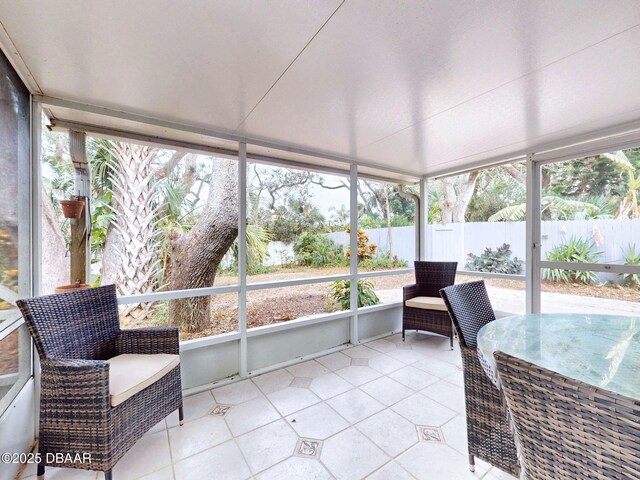 sunroom / solarium featuring plenty of natural light